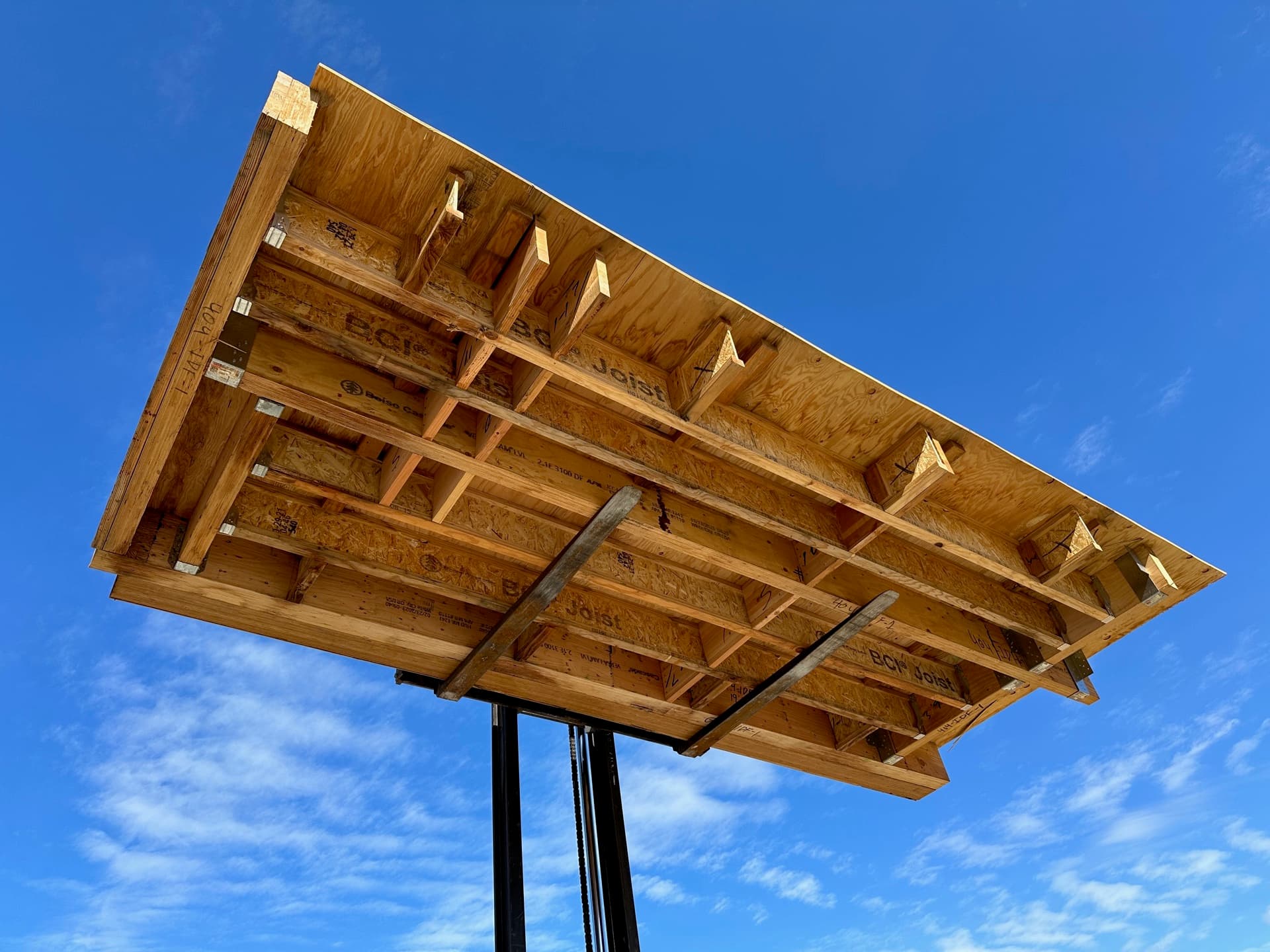 Floor cassette lifted against blue sky